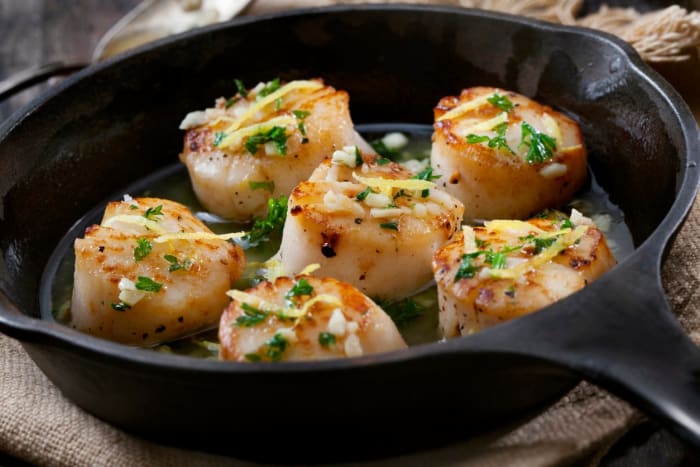 scallops-poached-in-a-butter-and-garlic-sauce