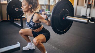How To Do a Barbell Squat According to Trainers