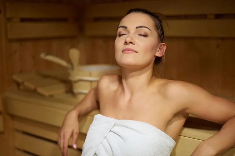 Woman Relaxing Sauna
